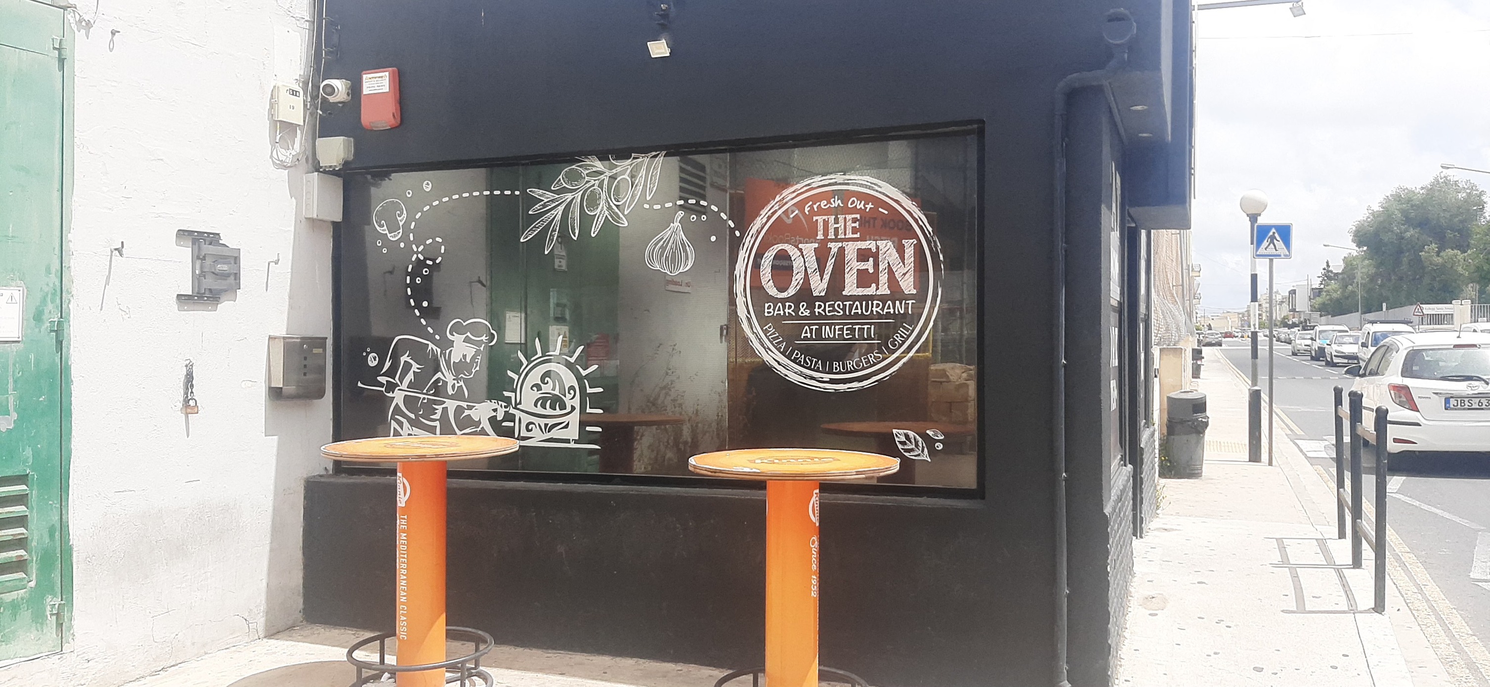 Custom-designed blackout window film used for privacy and advertisement display