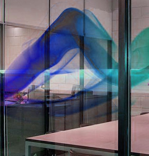 Custom-designed decorative window film installed in a stylish room