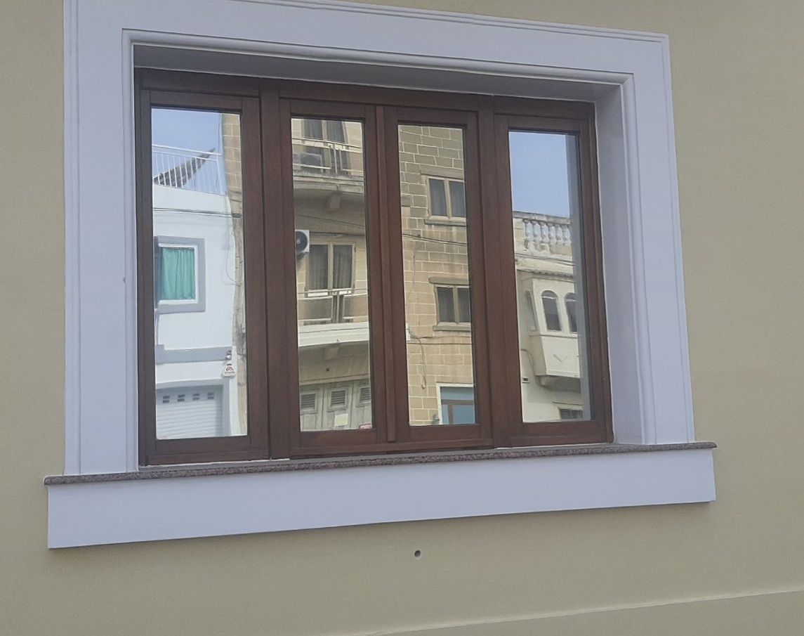 Custom-designed decorative window film installed in a stylish room